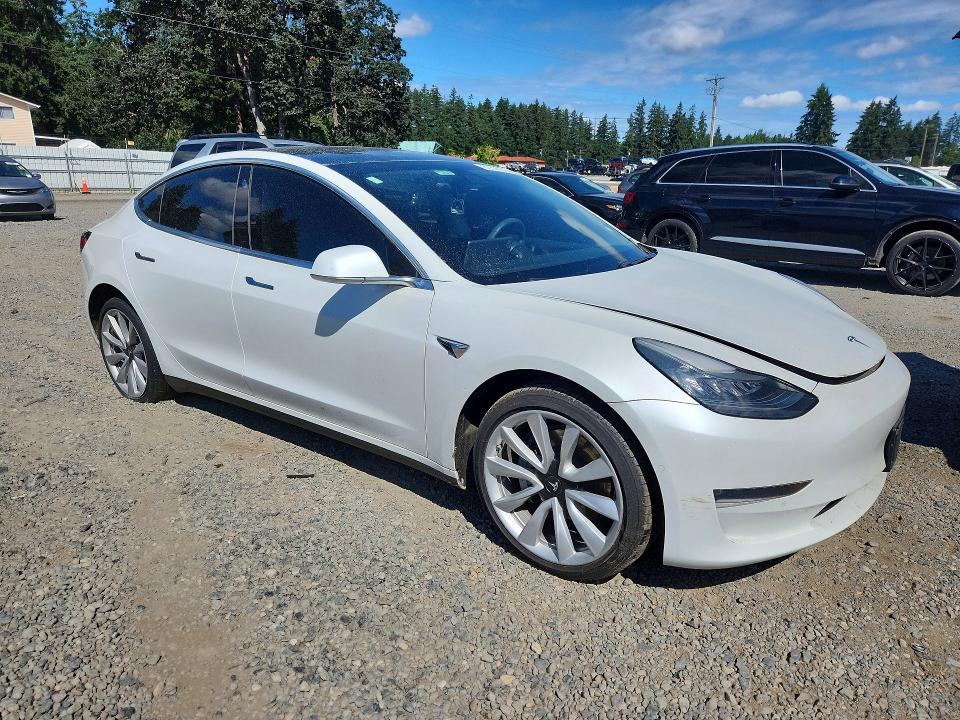 2019 Tesla Model 3 VIN 5YJ3E1EB4KF454223 COPART salvage auction — UNDERCARRIAGE, Wa - Vehicle Cert Of Ownership-Titl (P), sold $5,300 on 2026-07-31 (photo 4)