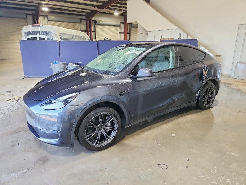 2025 Tesla Model y VIN 7SAYGDEE9SF318510 COPART salvage auction — SIDE, Pa - Cert Of Title, sold $16,800 on 2026-07-30 (photo 1)