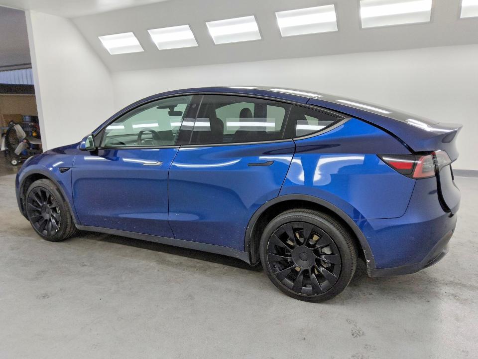 2022 Tesla Model y VIN 7SAYGDEE3NF481237 COPART salvage auction — SIDE, NV - CERTIFICATE OF TITLE, sold $9,700 on 2026-07-20 (photo 2)
