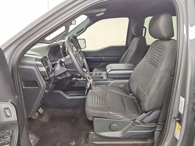 2021 Ford F-150 lightning VIN 1FTFW1E52MKD65101 COPART salvage auction — MINOR DENT/SCRATCHES, TX - CERTIFICATE OF TITLE, sold $14,600 on 2026-07-23 (photo 7)