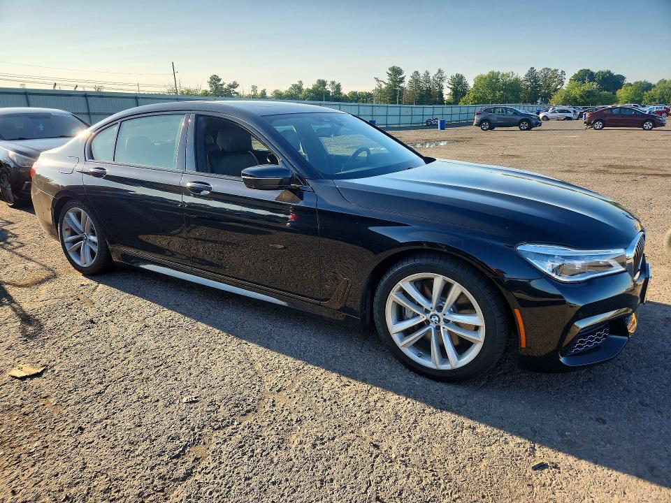 2016 BMW 7er VIN WBA7F2C55GG420299 COPART salvage auction — UNDERCARRIAGE, Pa - Certificate Of Salvage, sold $225 on 2026-07-28 (photo 4)