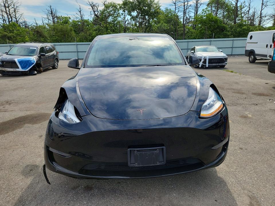 2023 Tesla Model y VIN 7SAYGDEE8PA100580 COPART salvage auction — FRONT END, Ny - Mv-907A Salvage Certificate, sold $10,500 on 2026-07-15 (photo 5)
