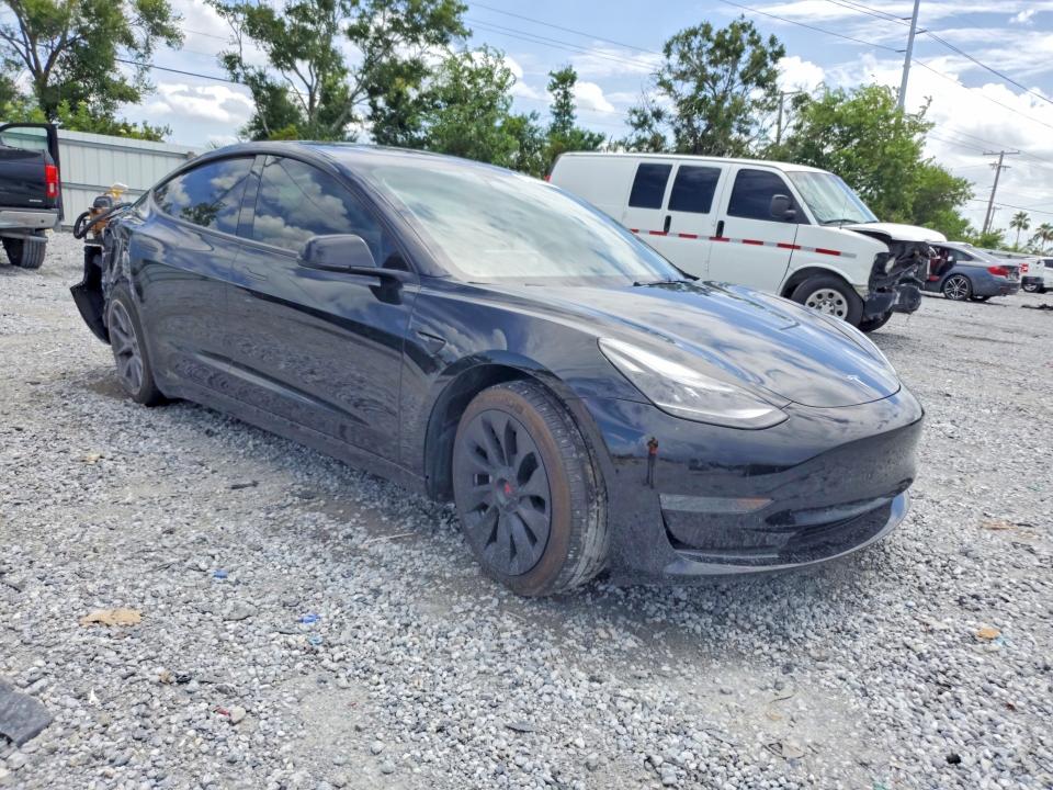 2023 Tesla Model 3 VIN 5YJ3E1EA9PF691269 COPART salvage auction — REAR END, Fl - Certificate Of Destruction, sold $5,100 on 2026-07-28 (photo 4)