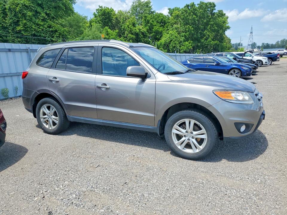 2012 Hyundai Santa fe VIN 5XYZGDAB1CG093748 COPART salvage auction — MINOR DENT/SCRATCHES, On - Permit No Brand - Unfit, sold $250 on 2026-07-21 (photo 4)