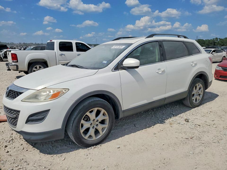 2012 Mazda 2 VIN JM3TB2CA2C0338700 COPART salvage auction — MINOR DENT/SCRATCHES, TX - CERT OF TITLE-REBUILT SALVAGE, sold $1,100 on 2026-07-31 (photo 1)