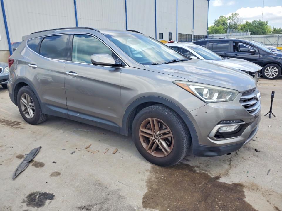 2017 Hyundai Santa fe VIN 5XYZU3LB3HG416866 COPART salvage auction — MECHANICAL, Tn - Certificate Of Title, sold $3,550 on 2026-07-08 (photo 4)