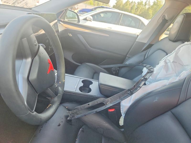 2023 Tesla Model y VIN LRWYGDEE0PC105007 COPART salvage auction — FRONT END, ON - PERMIT NO BRAND - UNFIT, sold $16,950 on 2026-08-18 (photo 9)