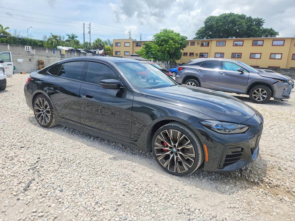 2024 BMW 4er VIN WBA63AV00RFR12232 COPART salvage auction — REAR END, Fl - Cert Of Title Slvg Rebuildable, sold $5,700 on 2026-07-21 (photo 4)