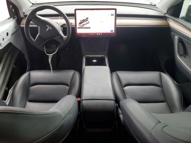 2023 Tesla Model y VIN 7SAYGDEEXPF742575 COPART salvage auction — FRONT END, CA - SALVAGE CERTIFICATE, sold $6,400 on 2026-07-16 (photo 8)