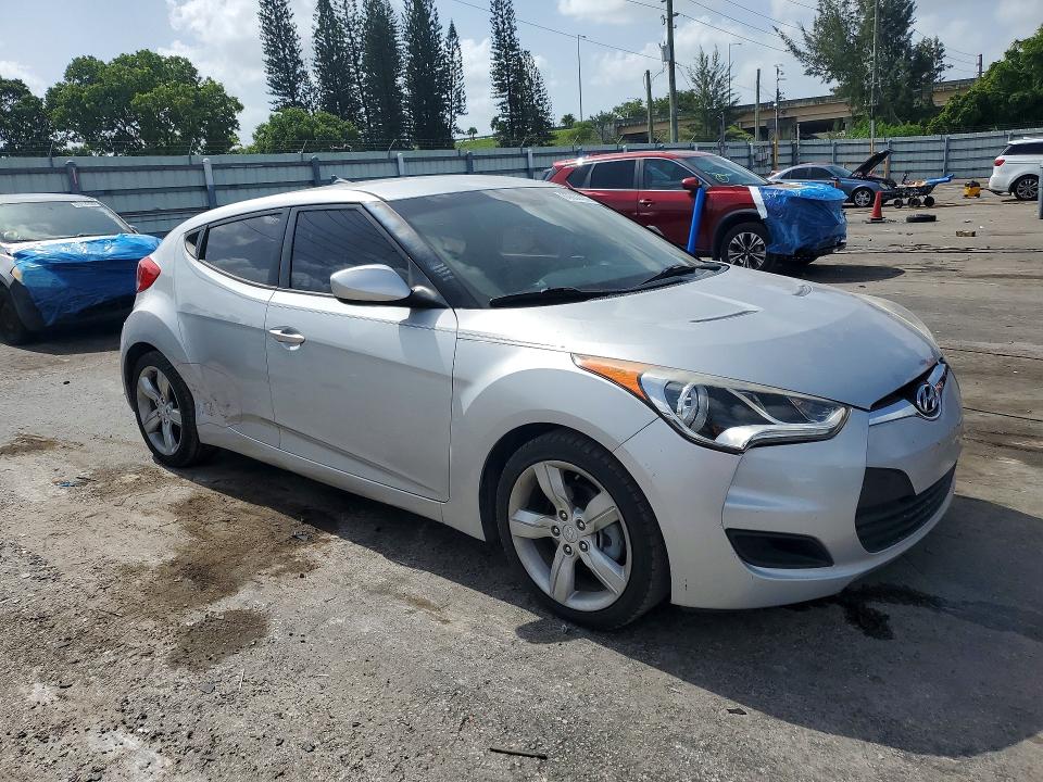 2015 Hyundai Veloster VIN KMHTC6AD1FU228546 COPART salvage auction — DAMAGE HISTORY, Fl - Cert Of Title-Flood & Rebuilt, sold $850 on 2026-07-29 (photo 4)