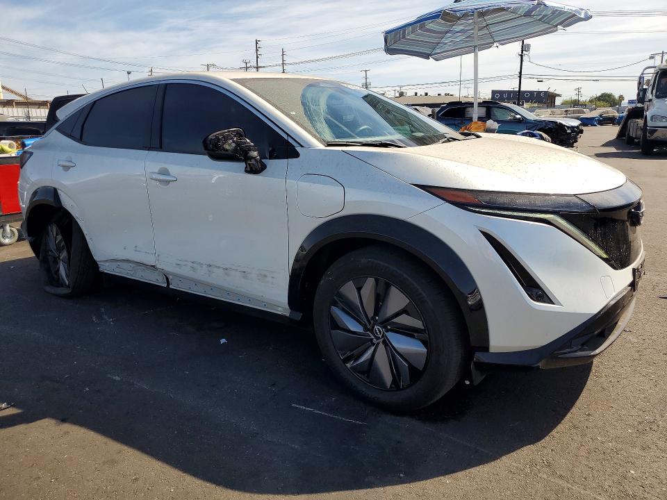 2024 Nissan Ariya VIN JN1AF0BA4RM436545 COPART salvage auction — SIDE, Ca - Salvage Certificate, sold $10,100 on 2026-08-24 (photo 4)