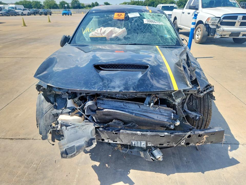 2023 Dodge Charger VIN 2C3CDXHG0PH512895 COPART salvage auction — ALL OVER, TX - CERTIFICATE OF TITLE, sold $1,500 on 2026-08-06 (photo 5)