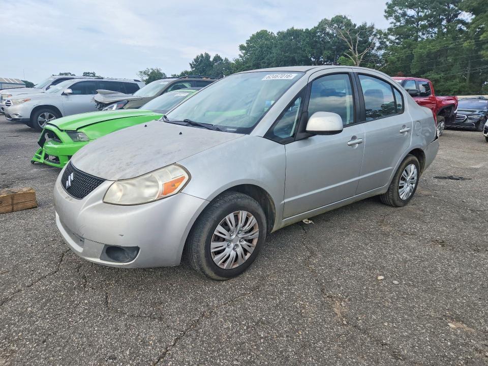 2011 Suzuki Sx4 VIN JS2YC5A26B6300770 COPART salvage auction — MINOR DENT/SCRATCHES, Al - Cert Of Title-Salvage Title, sold $225 on 2026-09-28 (photo 1)