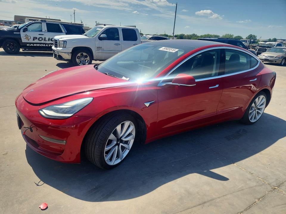 2018 Tesla Model 3 VIN 5YJ3E1EA4JF102961 COPART salvage auction — NORMAL WEAR, Tx - Cert Of Title-Rebuilt Salvage (P), sold $2,300 on 2026-07-21 (photo 1)