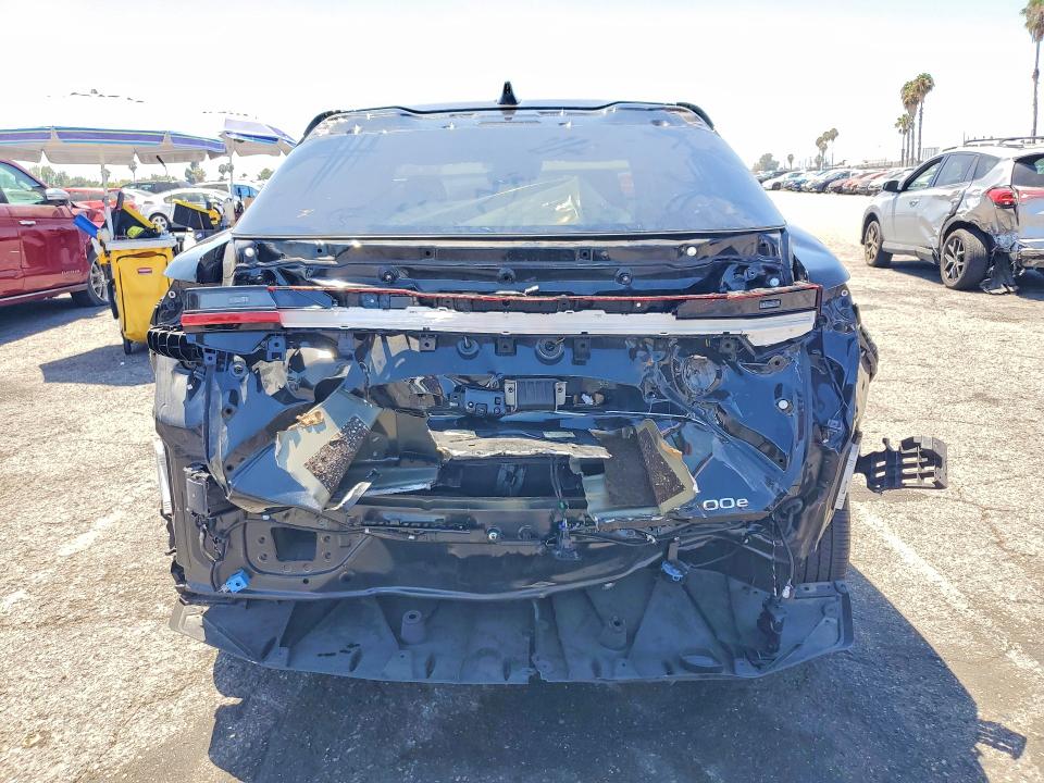 2024 Lexus Rz VIN JTJABABBXRA000420 COPART salvage auction — REAR END, CA - SALVAGE CERTIFICATE, sold $13,700 on 2026-08-28 (photo 6)