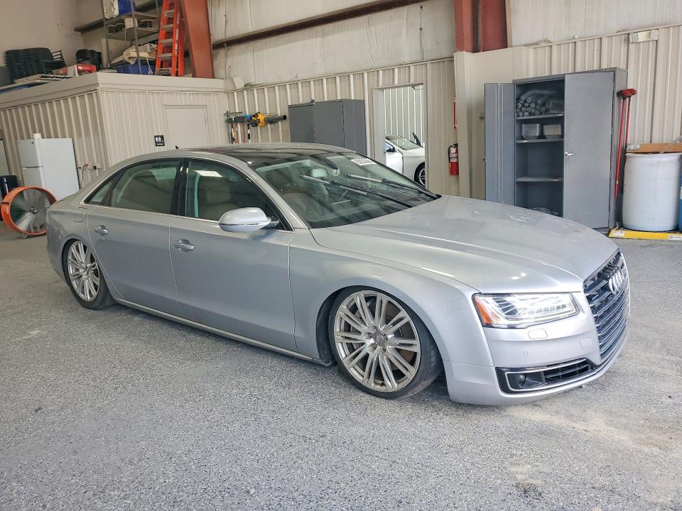 2015 Audi A8 VIN WAU32AFD0FN029353 COPART salvage auction — MINOR DENT/SCRATCHES, Nc - Dealer Only Clean Title, sold $4,950 on 2026-09-03 (photo 4)