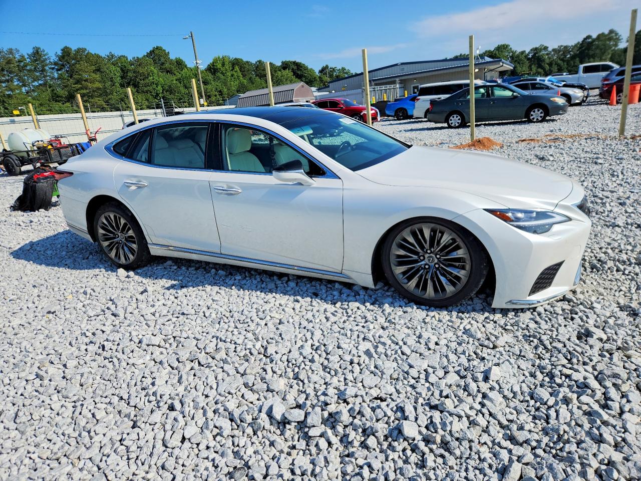 2023 Lexus LS 500 VIN JTHD51FF3P5018508 COPART salvage auction — Side, GA - CERT OF TITLE-SALVAGE, sold $33,750 on 2026-08-11 (photo 4)