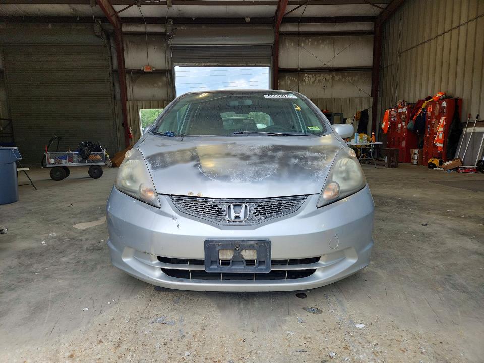 2012 Honda Fit VIN JHMGE8H38CS002129 COPART salvage auction — MINOR DENT/SCRATCHES, VA - CERT OF TITLE - SALVAGE, sold $200 on 2026-07-28 (photo 5)