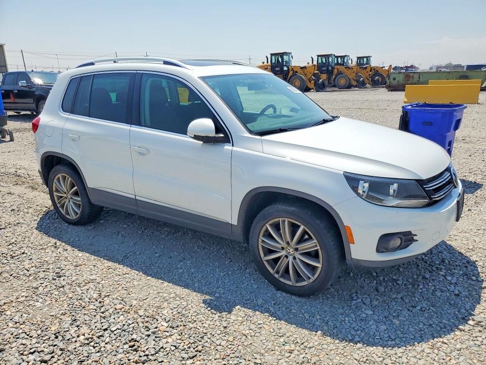 2015 Volkswagen Tiguan VIN WVGBV7AX5FW520078 COPART salvage auction — MECHANICAL, Co - Dis/Dlr/Exp Only Clean Title, sold $325 on 2026-08-06 (photo 4)