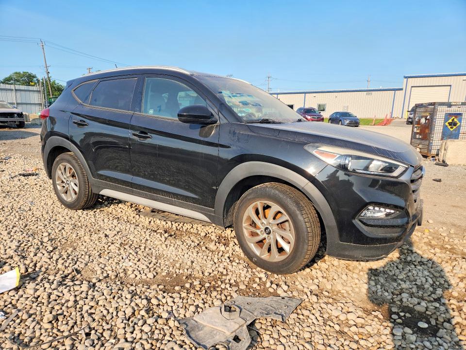 2017 Hyundai Tucson VIN KM8J3CA45HU433800 COPART salvage auction — VANDALISM, AZ - CERT OF TITLE - SALVAGE, sold $300 on 2026-07-24 (photo 4)