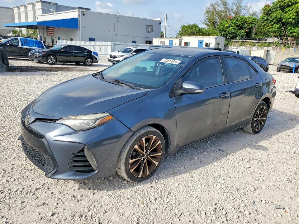 2017 Toyota Corolla VIN 5YFBURHE8HP616757 COPART salvage auction — SIDE, Fl - Cert Of Title Slvg Rebuildable, sold $2,100 on 2026-07-28 (photo 1)