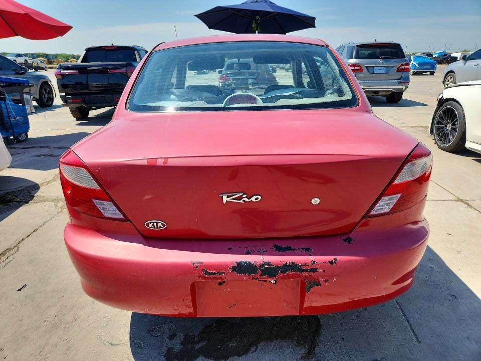 2002 Kia Rio VIN KNADC123926094298 COPART salvage auction — REAR END, TX - CERTIFICATE OF TITLE, sold $575 on 2026-07-09 (photo 6)