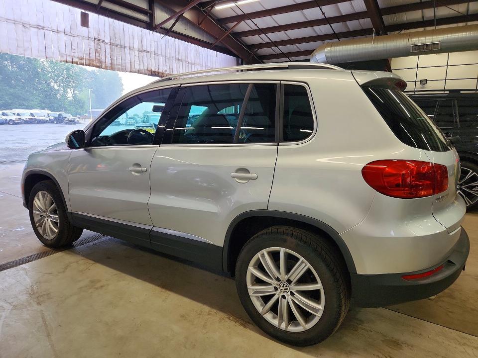 2012 Volkswagen Tiguan VIN WVGBV7AX1CW527346 COPART salvage auction — MINOR DENT/SCRATCHES, Vt - Certificate Of Title (P), sold $1,500 on 2026-07-28 (photo 2)