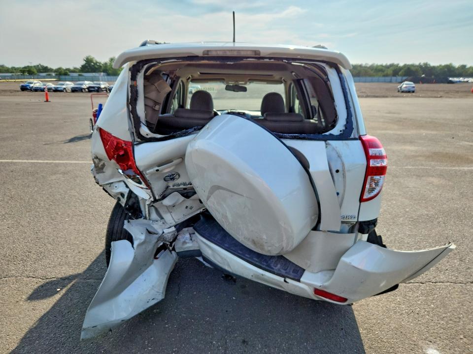 2010 Toyota Rav4 VIN JTMDF4DVXA5020791 COPART salvage auction — REAR END, NY - MV-907A SALVAGE CERTIFICATE, sold $875 on 2026-07-27 (photo 6)