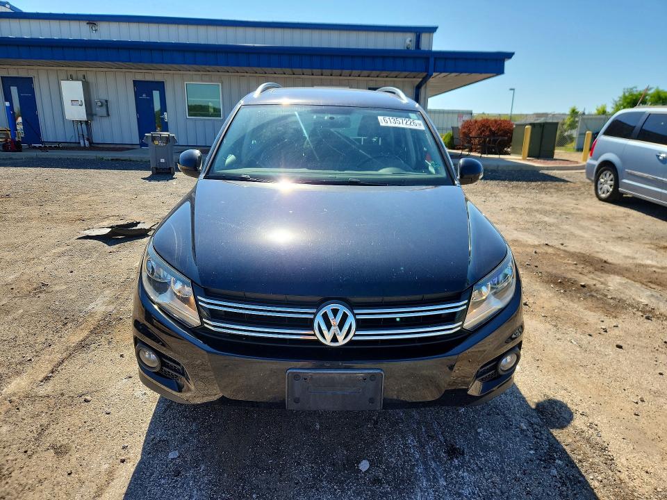 2012 Volkswagen Tiguan VIN WVGAV7AX4CW532388 COPART salvage auction — MINOR DENT/SCRATCHES, Wi - Certificate Of Title, sold $200 on 2026-07-21 (photo 5)