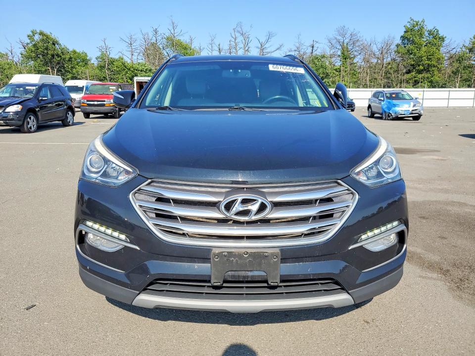 2018 Hyundai Santa fe VIN 5XYZUDLB8JG541714 COPART salvage auction — REAR END, Ny - Mv-907A Salvage Certificate, sold $4,550 on 2026-07-20 (photo 5)