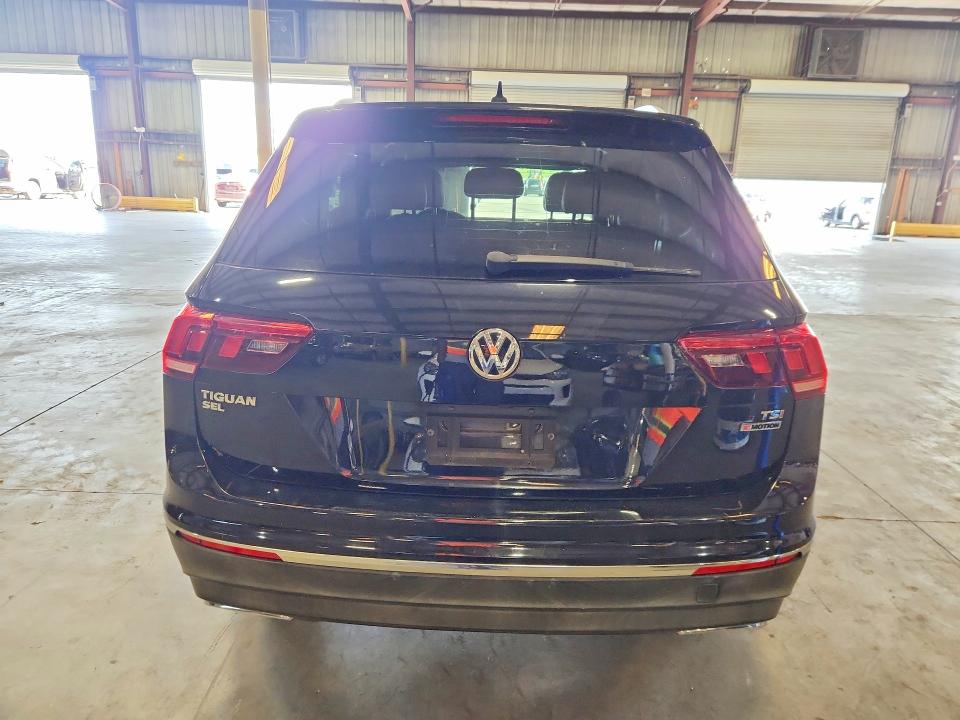 2018 Volkswagen Tiguan VIN 3VV2B7AX7JM067671 COPART salvage auction — MECHANICAL, Fl - Certificate Of Title, sold $2,300 on 2026-07-20 (photo 6)