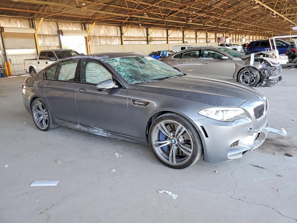 2013 BMW M5 VIN WBSFV9C51DD096994 COPART salvage auction — ROLLOVER, AZ - CERTIFICATE OF TITLE, sold $225 on 2026-07-22 (photo 4)