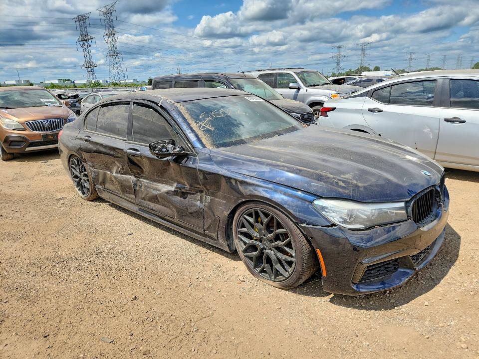 2017 BMW 7er VIN WBA7E4C57HGU99328 COPART salvage auction — SIDE, In - Certificate Of Title (P), sold $2,950 on 2026-08-13 (photo 4)