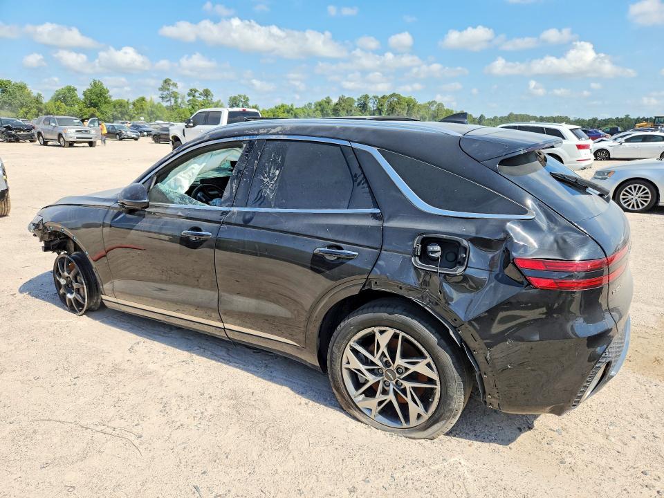 2023 Genesis Gv70 VIN KMUMADTB4PU138675 COPART salvage auction — ROLLOVER, Tx - Salvage Vehicle Title (P), sold $3,950 on 2026-07-10 (photo 2)