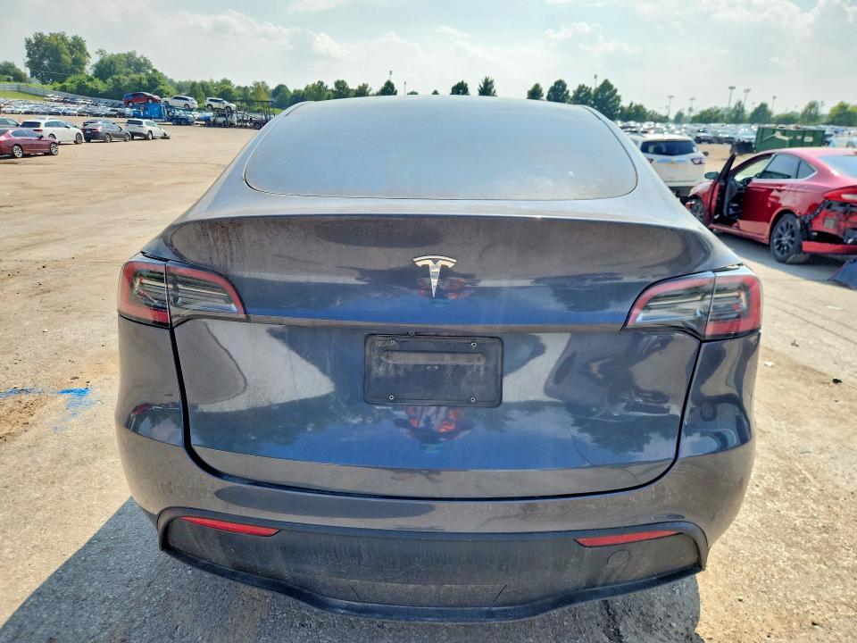 2023 Tesla Model y VIN 7SAYGDEF5PA049323 COPART salvage auction — NORMAL WEAR, MO - CERTIFICATE OF TITLE, sold $9,000 on 2026-07-28 (photo 6)