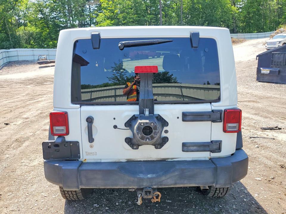2015 Jeep Wrangler / VIN 1C4AJWAGXFL529916 COPART salvage auction — MINOR DENT/SCRATCHES, Vt - Rebuilt Junk, sold $2,600 on 2026-08-31 (photo 6)