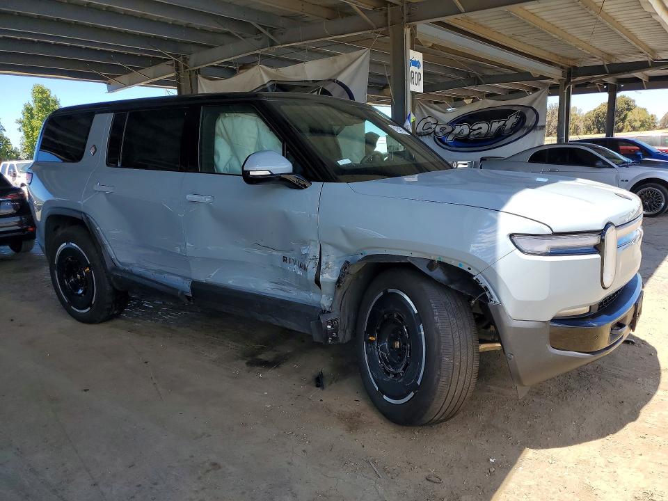 2025 Rivian R1s VIN 7PDSGBBA9SN055714 COPART salvage auction — SIDE, CA - SALVAGE CERTIFICATE, sold $28,250 on 2026-09-29 (photo 4)