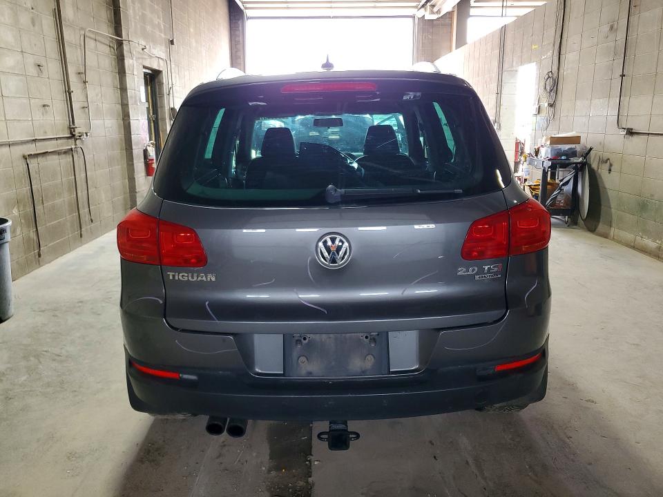 2014 Volkswagen Tiguan VIN WVGBV3AX1EW536530 COPART salvage auction — FRONT END, MN - CERT OF TITLE-PRIOR SALVAGE, sold $525 on 2026-08-06 (photo 6)