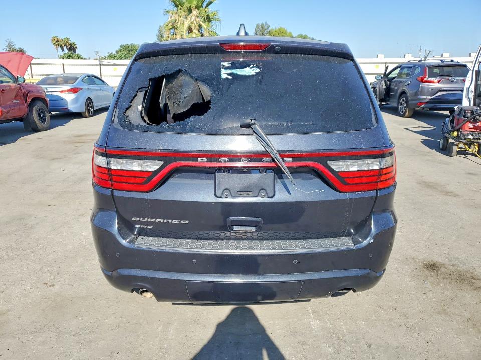 2014 Dodge Durango VIN 1C4RDJAG9EC978998 COPART salvage auction — VANDALISM, Ca - Salvage Certificate, sold $2,100 on 2026-08-21 (photo 6)