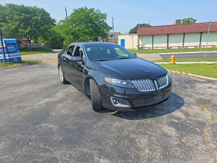 2012 Lincoln Mks VIN 1LNHL9FT8CG806403 COPART salvage auction — NORMAL WEAR, Salvage Title, sold $1,000 on 2026-07-22 (photo 1)