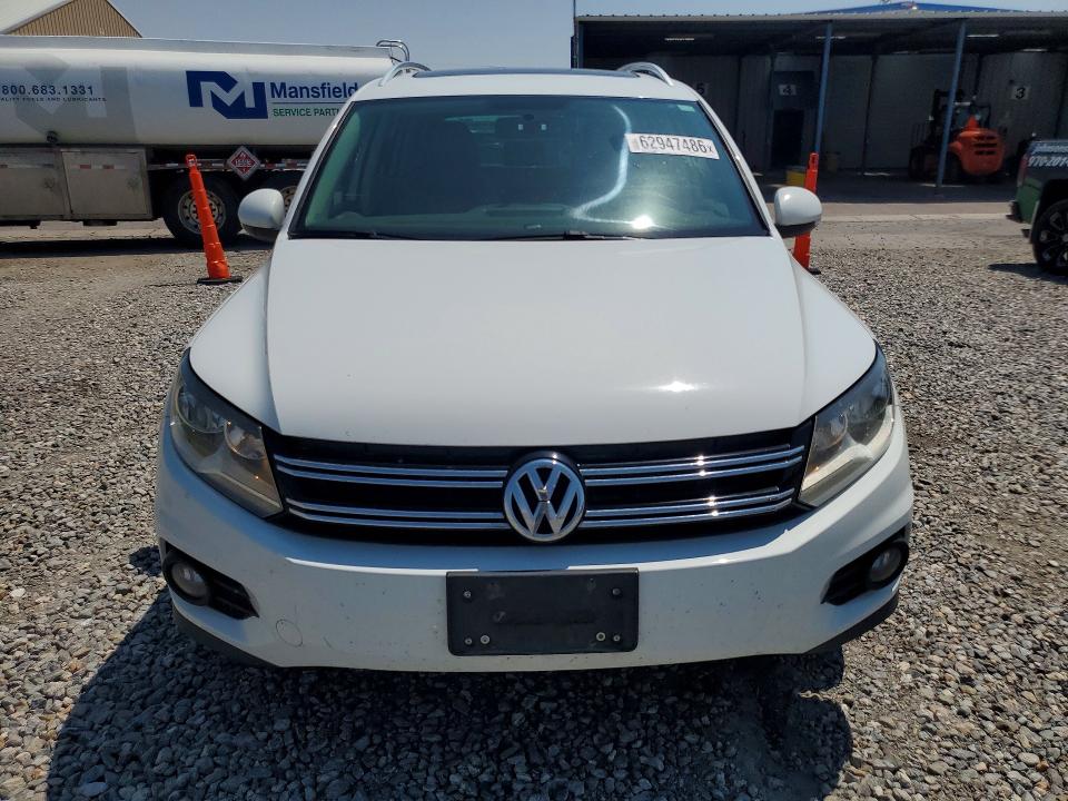 2015 Volkswagen Tiguan VIN WVGBV7AX5FW520078 COPART salvage auction — MECHANICAL, Co - Dis/Dlr/Exp Only Clean Title, sold $325 on 2026-08-06 (photo 5)