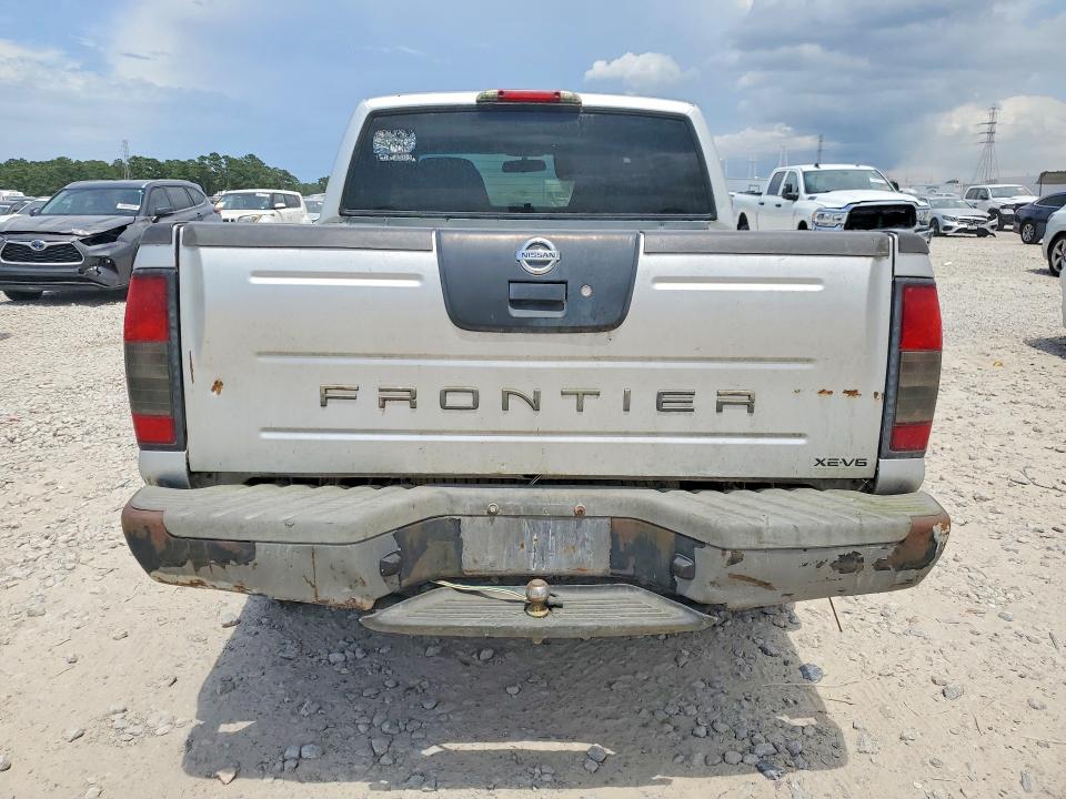 2004 Nissan Frontier VIN 1N6ED27T64C437539 COPART salvage auction — WATER/FLOOD, TX - SALVAGE TITLE-FLOOD DAMAGE, sold $300 on 2026-09-11 (photo 6)