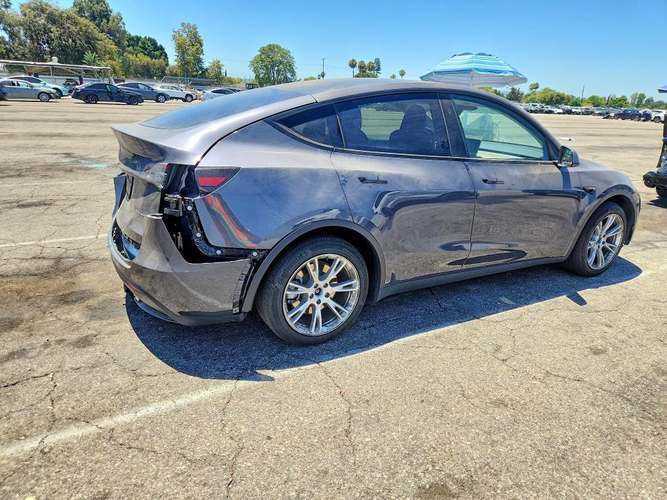 2023 Tesla Model y VIN 7SAYGDEE8PF918877 COPART salvage auction — REAR END, CA - SALVAGE CERTIFICATE, sold $15,700 on 2026-07-24 (photo 3)