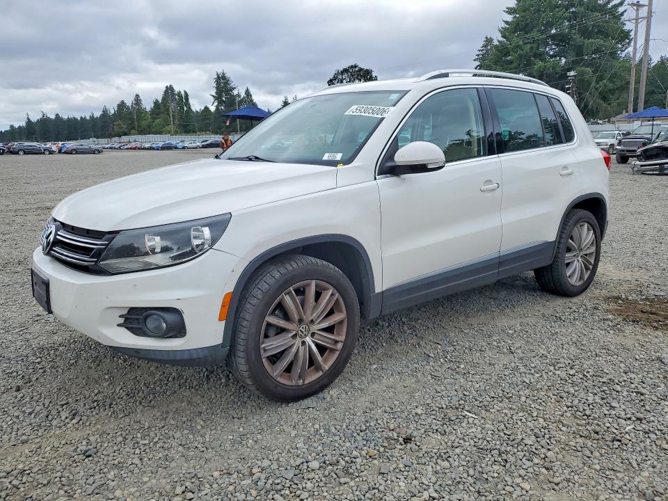 2012 Volkswagen Tiguan VIN WVGBV7AX8CW581906 COPART salvage auction — MINOR DENT/SCRATCHES, Wa - Vehicle Cert Of Ownership-Titl, sold $1,000 on 2026-07-14 (photo 1)
