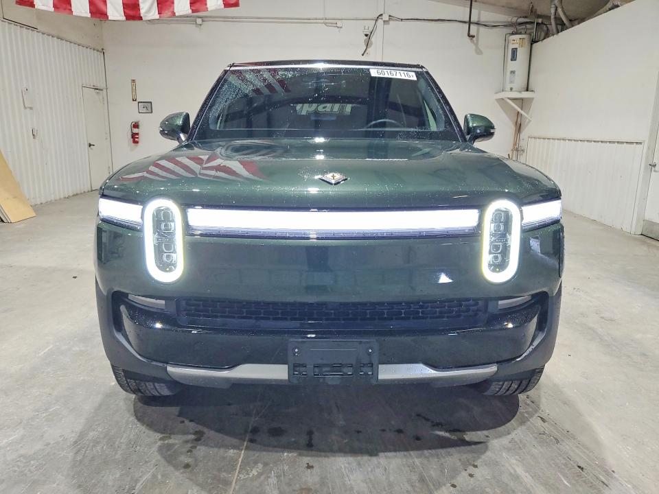 2025 Rivian R1s VIN 7PDSGBBA6SN057582 COPART salvage auction — MINOR DENT/SCRATCHES, Ok - Cert Of Title-Rebuilt, sold $33,250 on 2026-07-08 (photo 5)