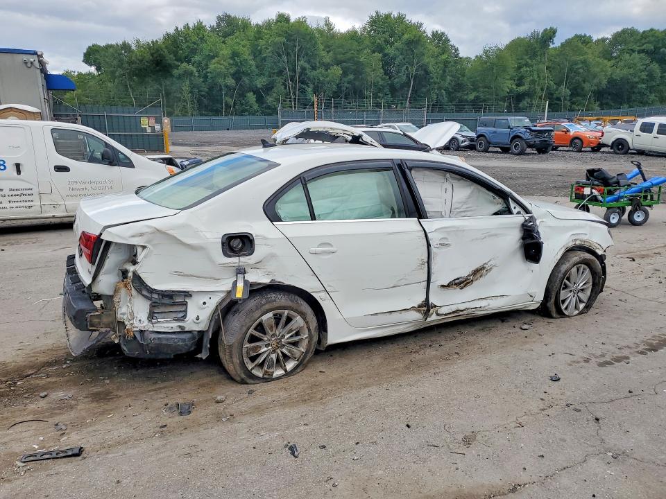 2015 Volkswagen Jetta VIN 3VW3A7AJXFM262055 COPART salvage auction — ROLLOVER, Pa - Cert Of Salv-R=Reconstructed, sold $2 on 2026-08-19 (photo 3)