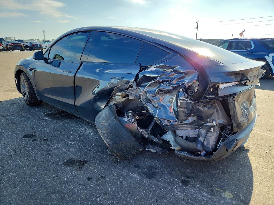 2026 Tesla Model y VIN 7SAYGDEE0TA406263 COPART salvage auction — REAR END, FL - CERTIFICATE OF DESTRUCTION, sold $2,700 on 2026-07-29 (photo 2)