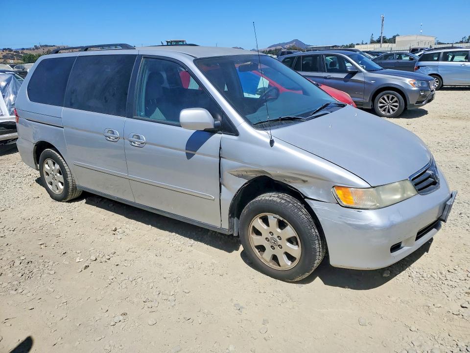 2002 Honda Odyssey VIN 2HKRL18612H555171 COPART salvage auction — FRONT END, CA - SALVAGE CERTIFICATE, sold $900 on 2026-08-04 (photo 4)