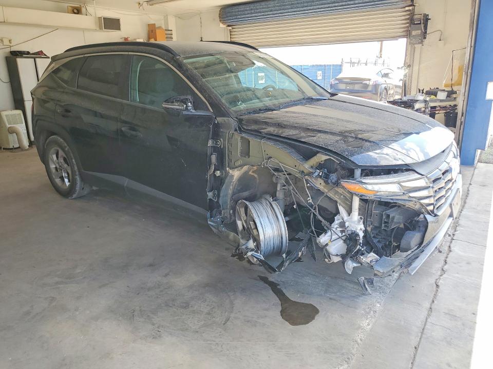 2022 Hyundai Tucson VIN 5NMJB3AE5NH041449 COPART salvage auction — FRONT END, TX - SALVAGE VEHICLE TITLE (P), sold $4,500 on 2026-07-10 (photo 4)