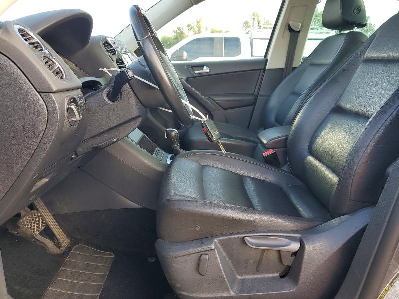 2013 Volkswagen Tiguan VIN WVGBV3AX6DW588847 COPART salvage auction — MINOR DENT/SCRATCHES, Or - Certificate Of Title, sold $1,700 on 2026-08-10 (photo 7)